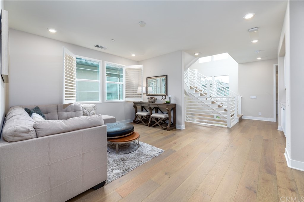 56 Swift Irvine, CA 92618 - Photo 14 of 43 a living room with furniture and a large window