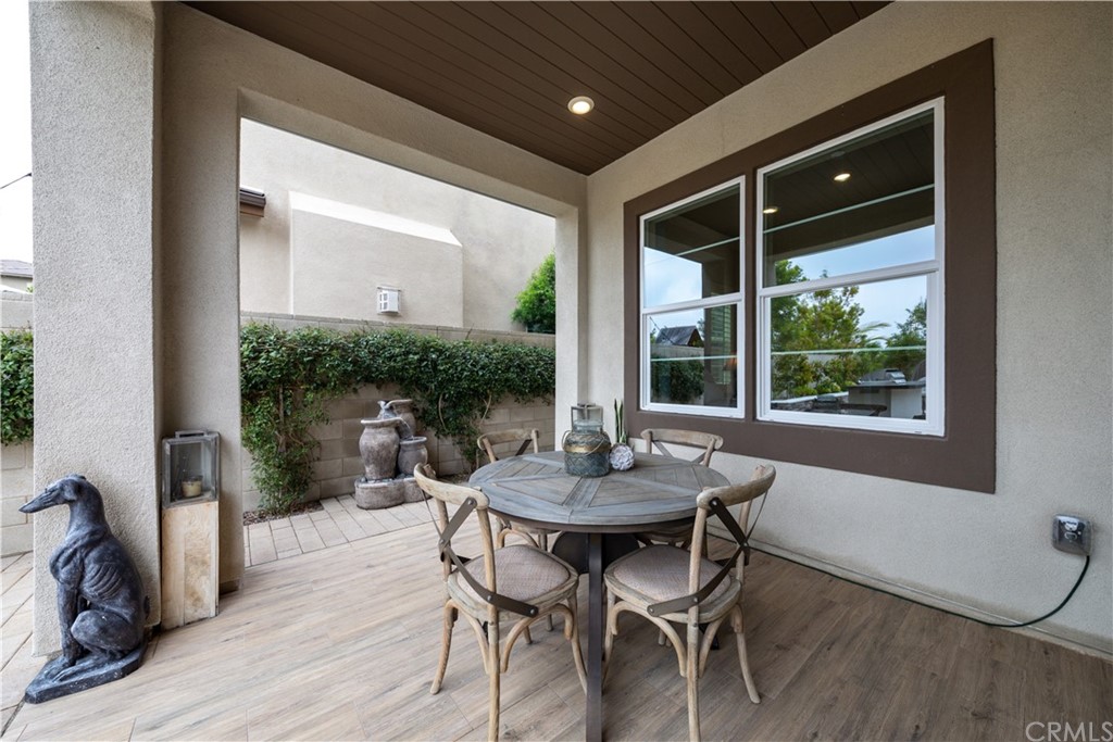 56 Swift Irvine, CA 92618 - Photo 25 of 43 a view of a dining room with furniture window and outside view