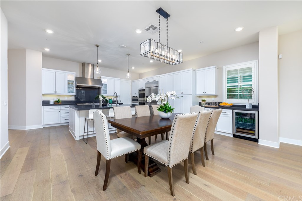56 Swift Irvine, CA 92618 - Photo 3 of 43 a view of a dining room with furniture and wooden floor