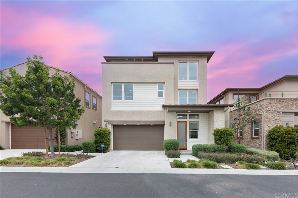 56 Swift Irvine, CA 92618 - Photo 31 of 43 front view of a house with a yard