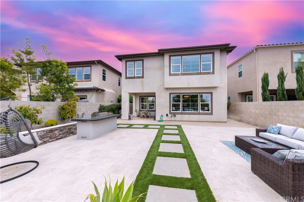 56 Swift Irvine, CA 92618 - Photo 32 of 43 a front view of a house with a yard