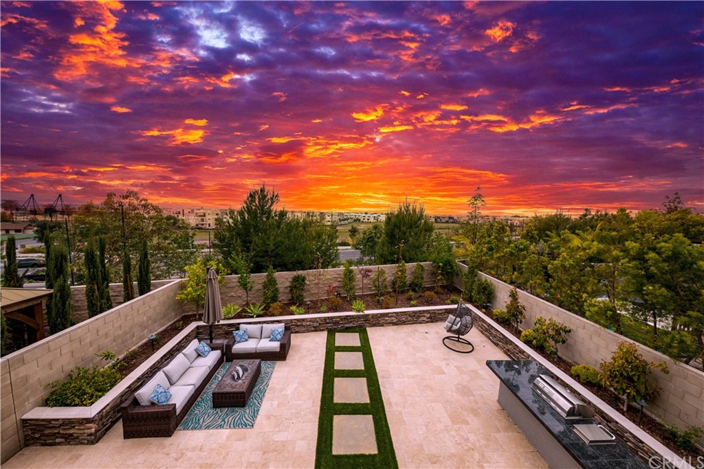 56 Swift Irvine, CA 92618 - Photo 36 of 43 a view of a balcony with wooden floor and a potted plant