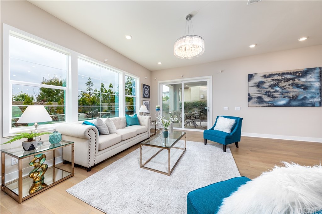 56 Swift Irvine, CA 92618 - Photo 5 of 43 a living room with furniture and a large window