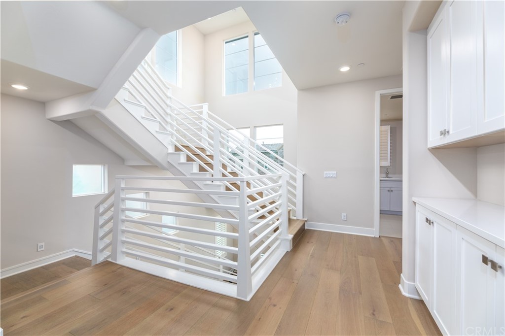 56 Swift Irvine, CA 92618 - Photo 7 of 43 a view of entryway with wooden floor