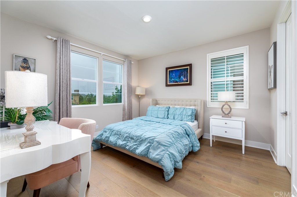 56 Swift Irvine, CA 92618 - Photo 8 of 43 a bedroom with a bed and a large window