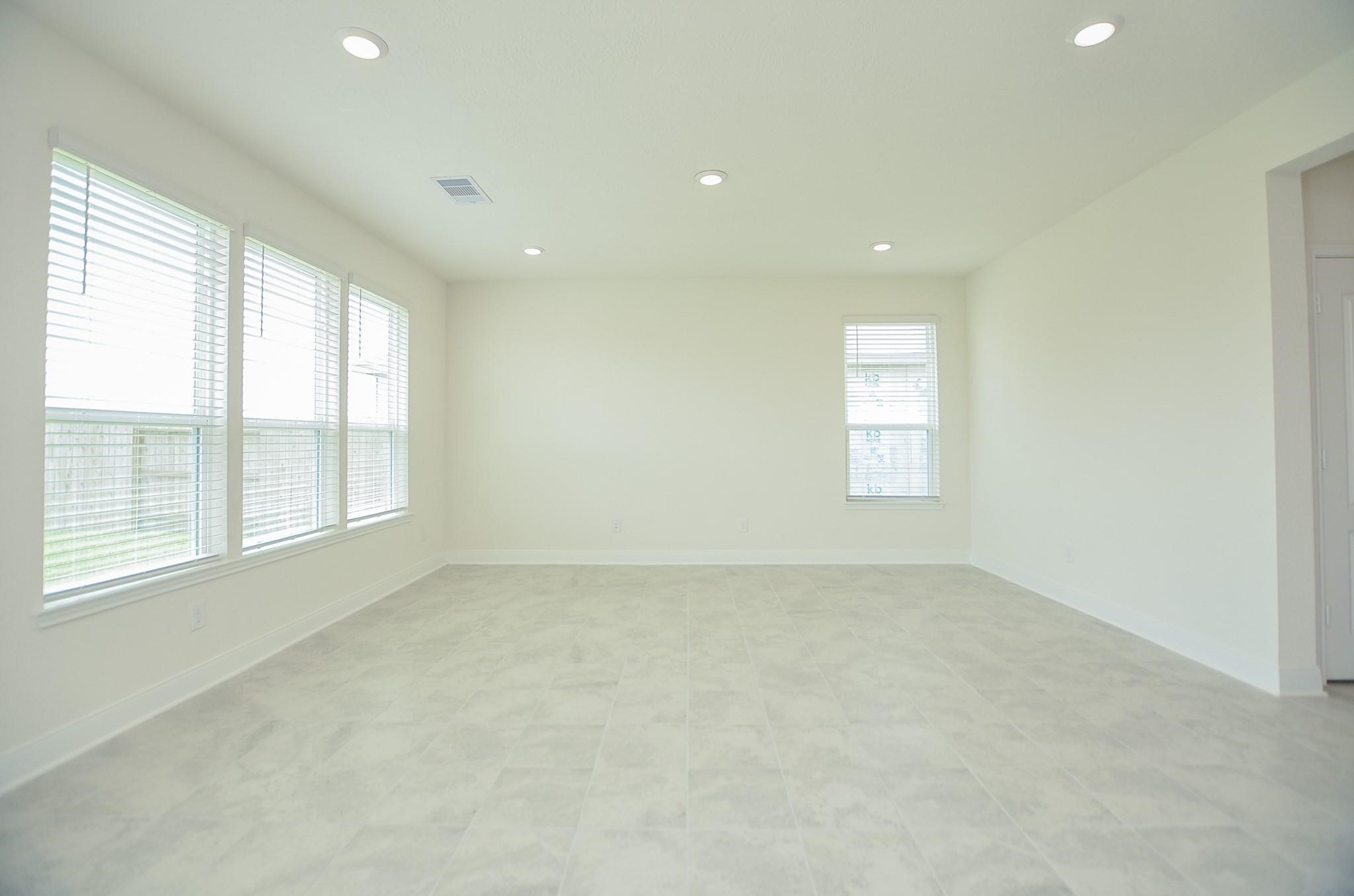 20907 Filbert Lane Katy, TX 77449 - Photo 11 of 43 an empty room with windows