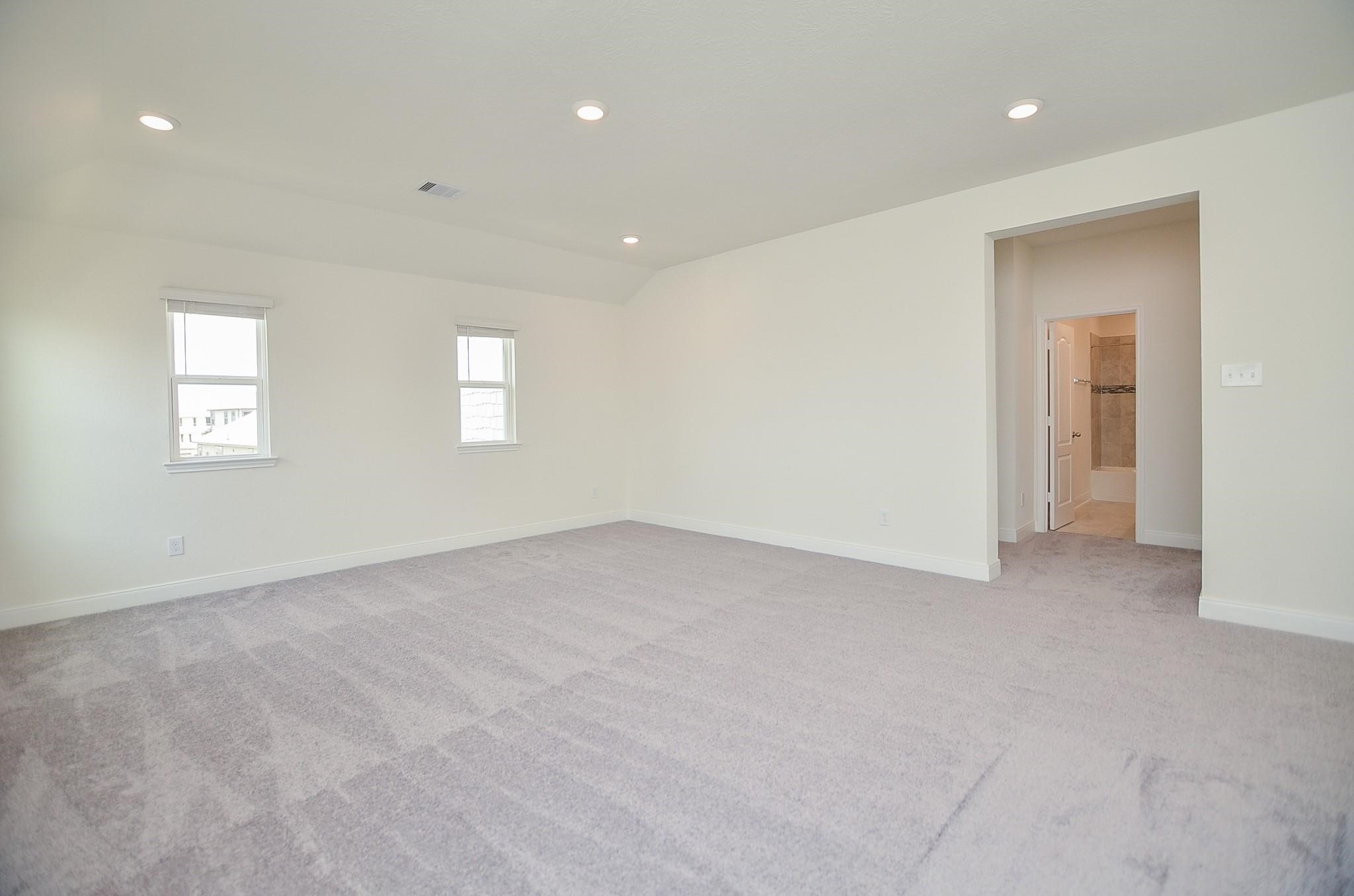 20907 Filbert Lane Katy, TX 77449 - Photo 28 of 43 an empty room with windows and closet