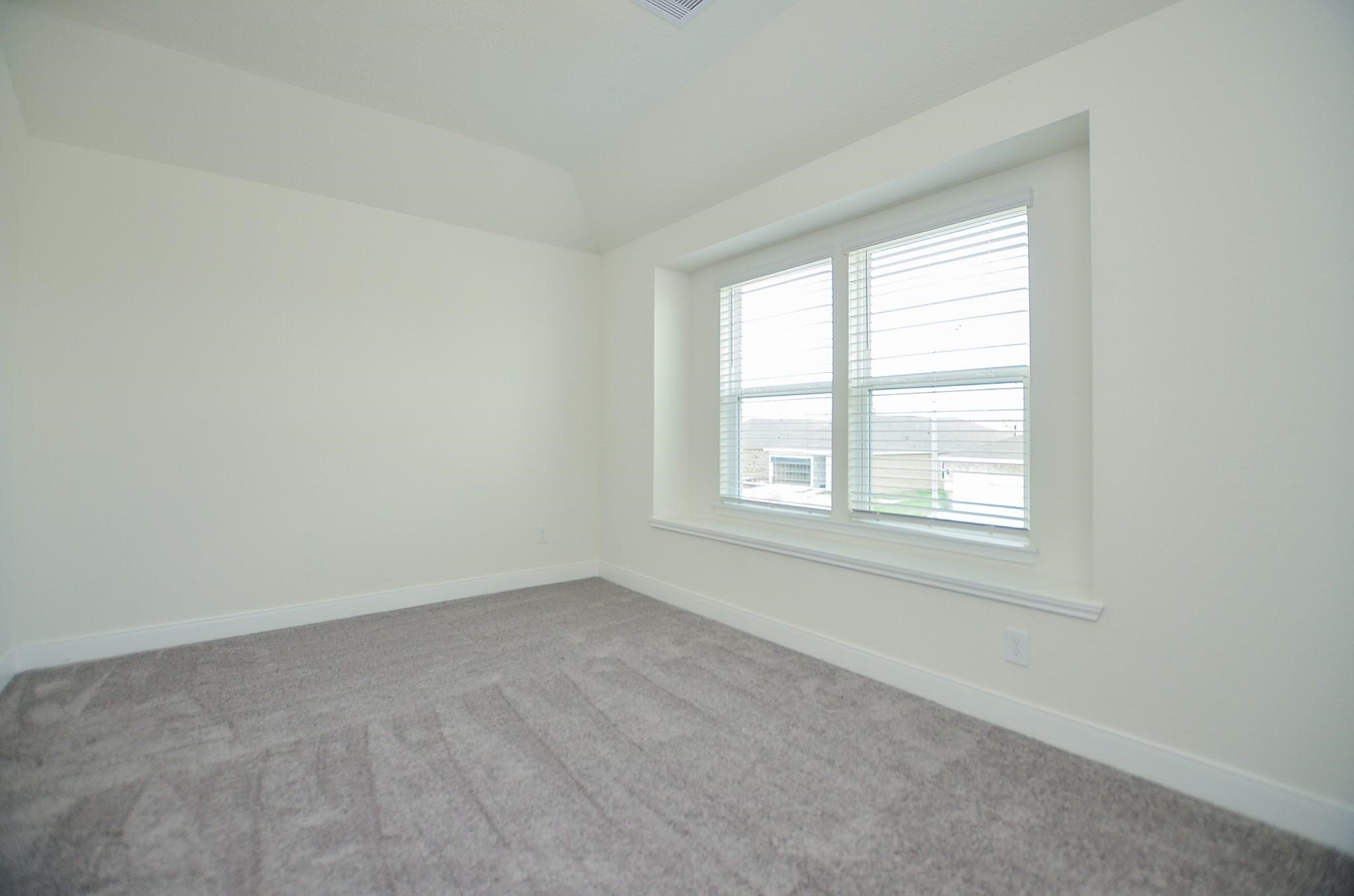 20907 Filbert Lane Katy, TX 77449 - Photo 32 of 43 an empty room with a window