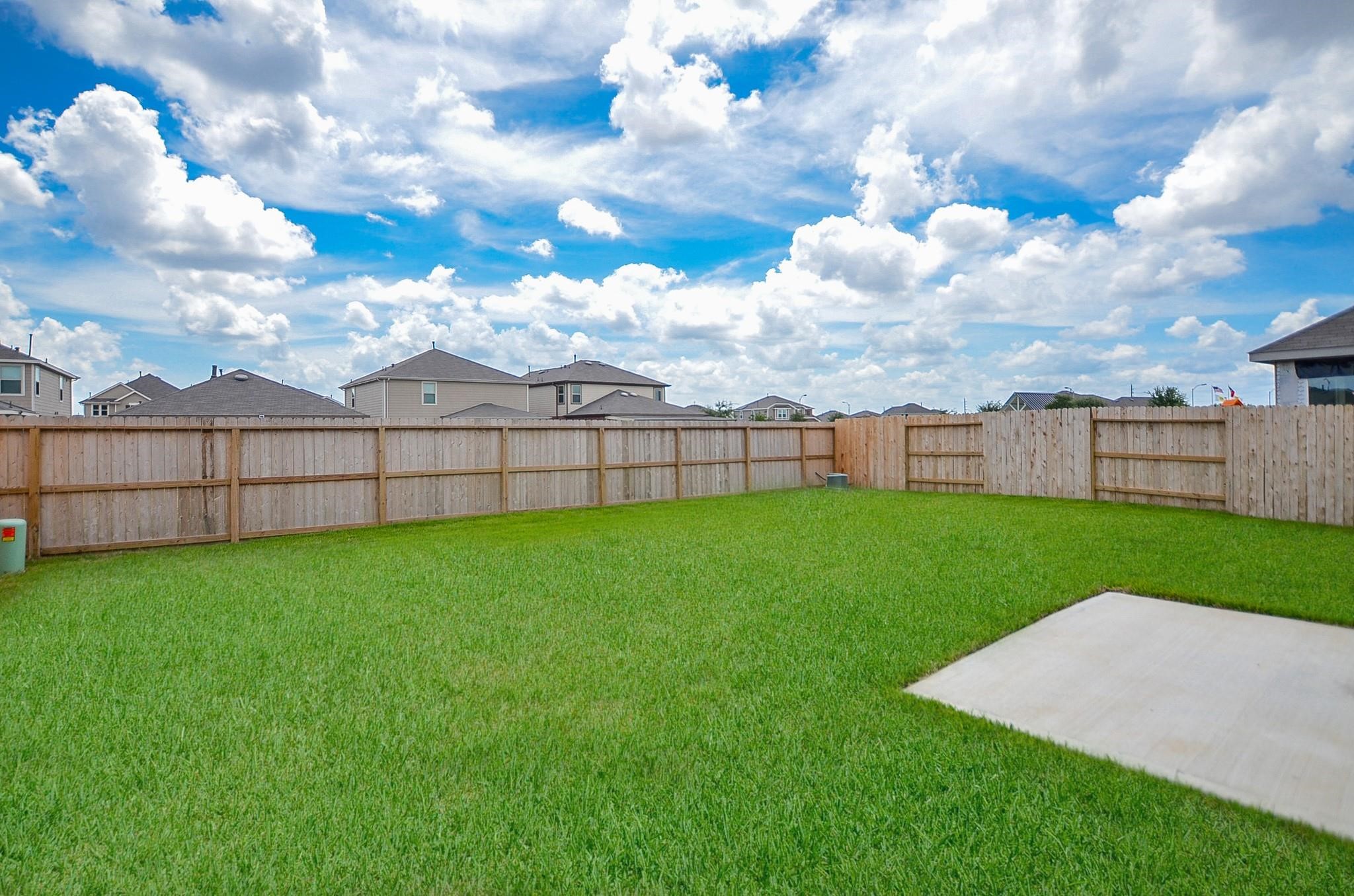 20907 Filbert Lane Katy, TX 77449 - Photo 41 of 43 a view of a yard with grass and a fence