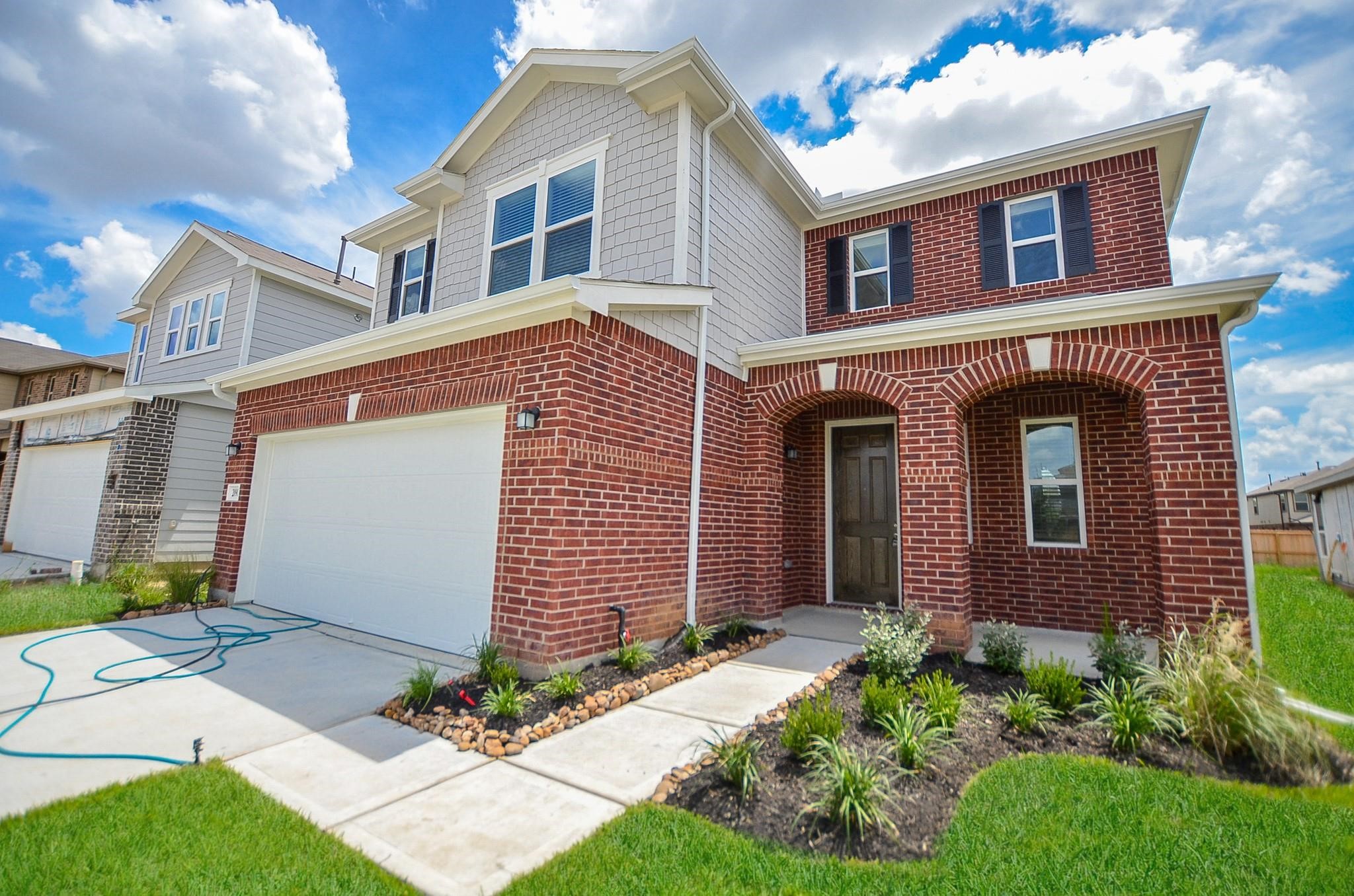 20907 Filbert Lane Katy, TX 77449 - Photo 42 of 43 a front view of a house with garden