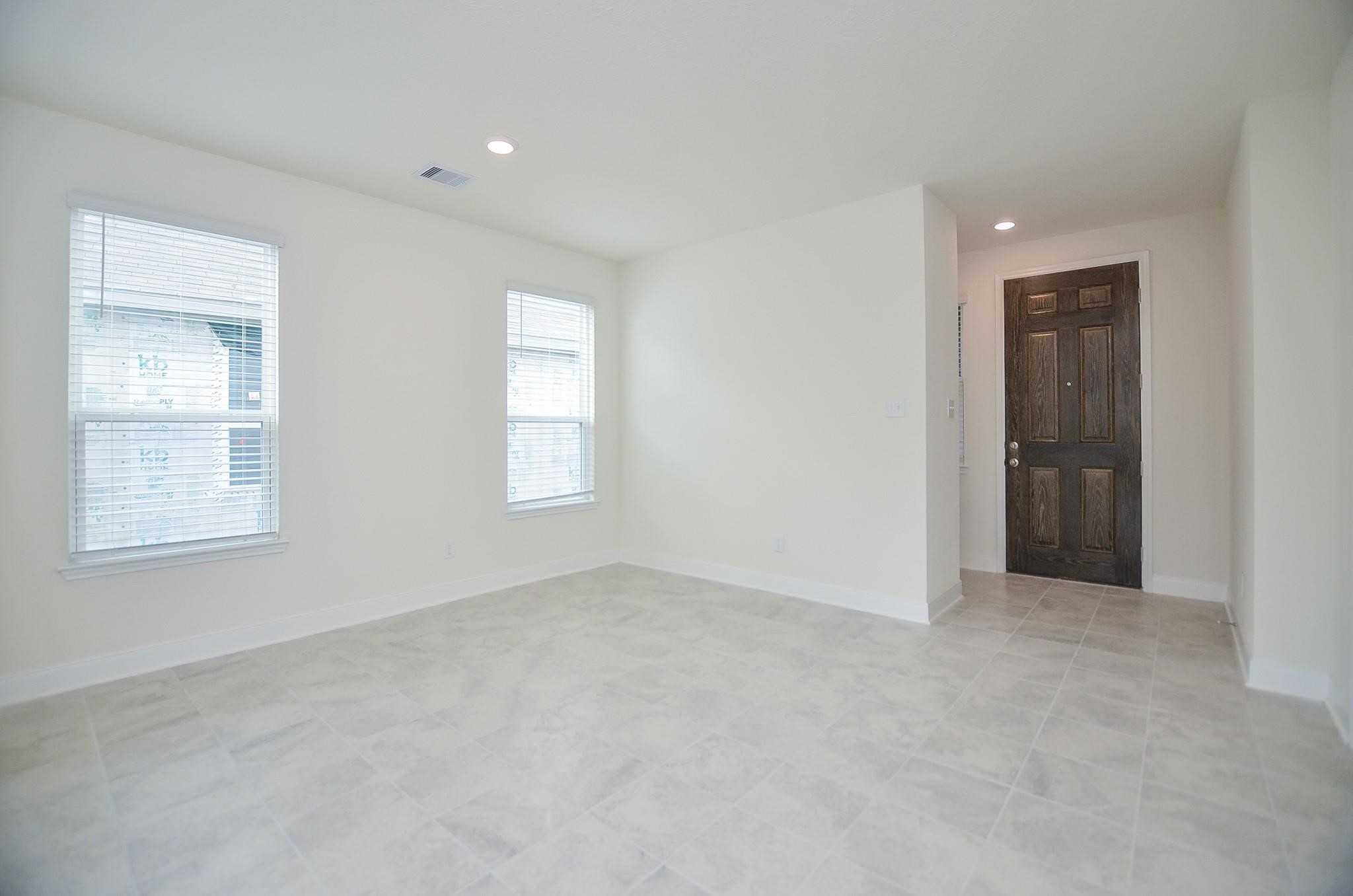 20907 Filbert Lane Katy, TX 77449 - Photo 6 of 43 an empty room with windows and closet