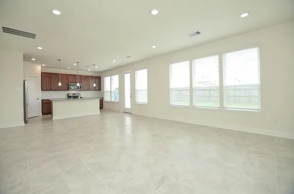 an empty room with windows