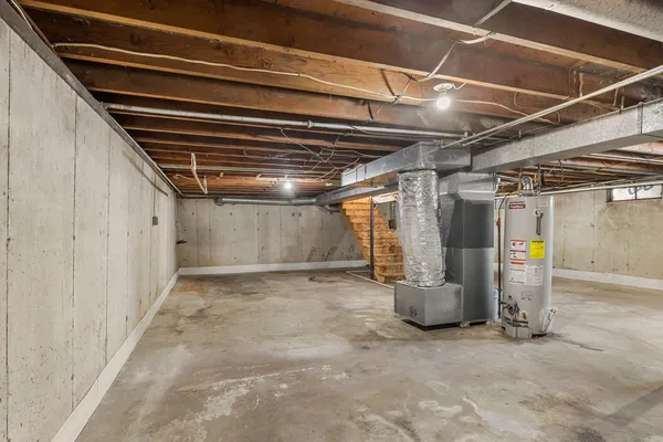 a view of empty room with stairs