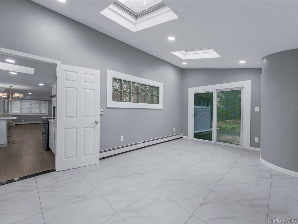 19 Ridge Drive East Roslyn, NY 11576 - Photo 13 of 33 a view of an empty room with a window