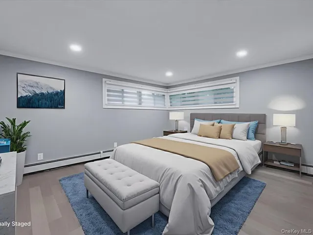 a spacious bedroom with a large bed and a couch