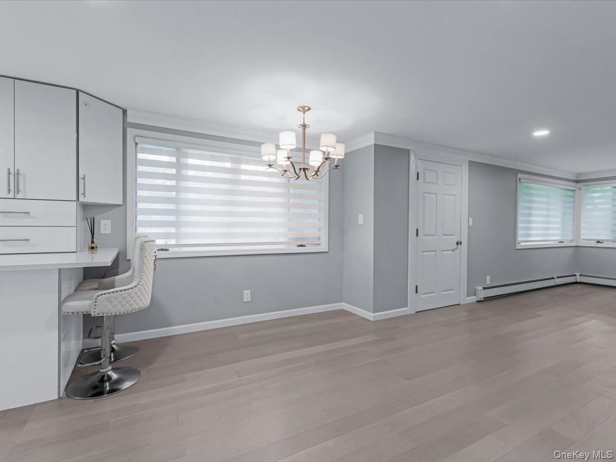 19 Ridge Drive East Roslyn, NY 11576 - Photo 8 of 33 a view of an empty room with a window