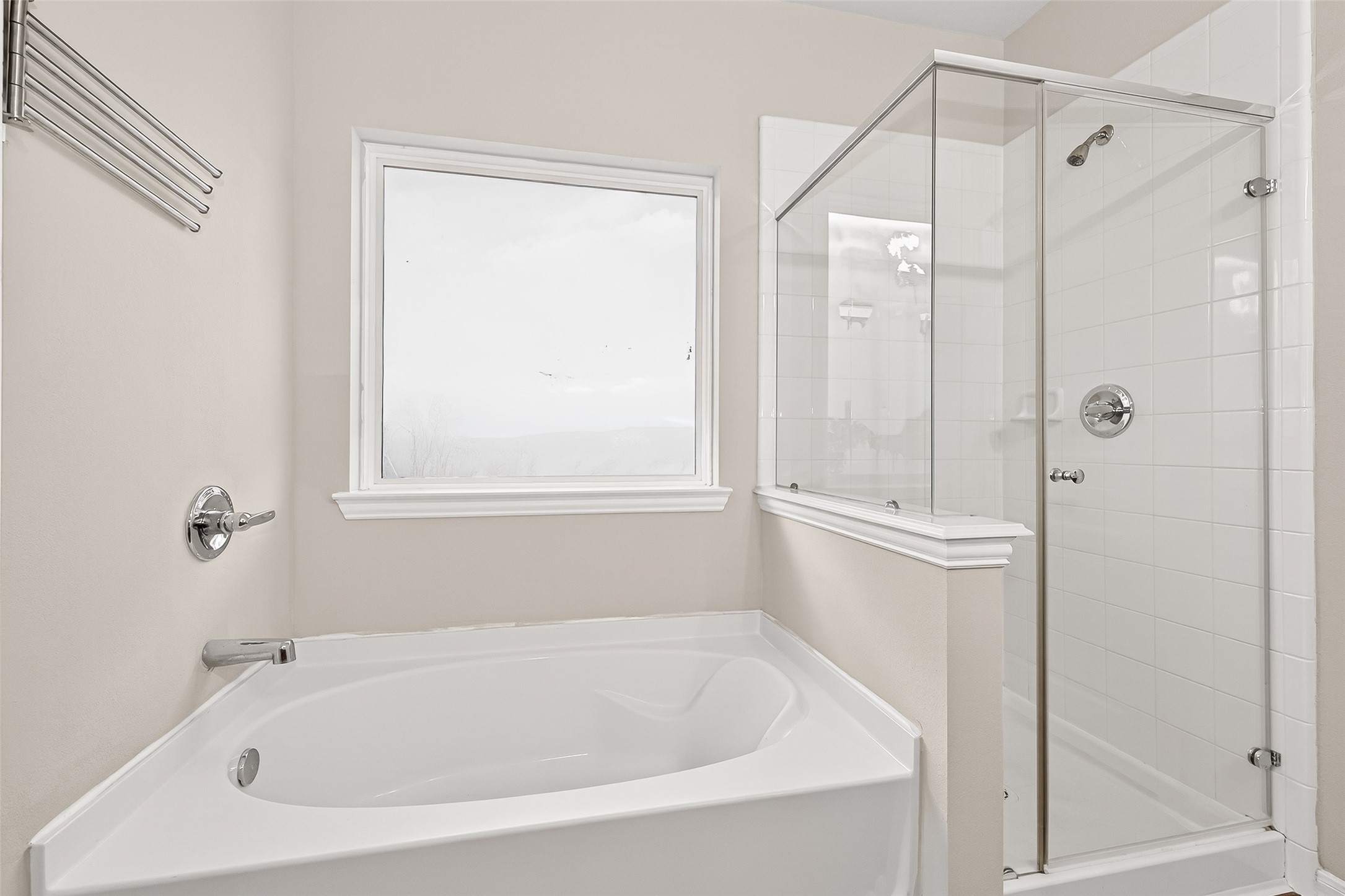 11211 Riata Canyon Drive Cypress, TX 77433 - Photo 15 of 33 a white bath tub sitting next to a shower
