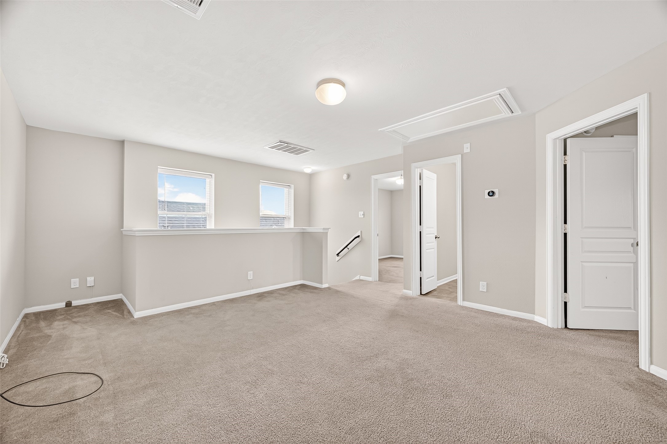 11211 Riata Canyon Drive Cypress, TX 77433 - Photo 21 of 33 a view of an empty room with a window