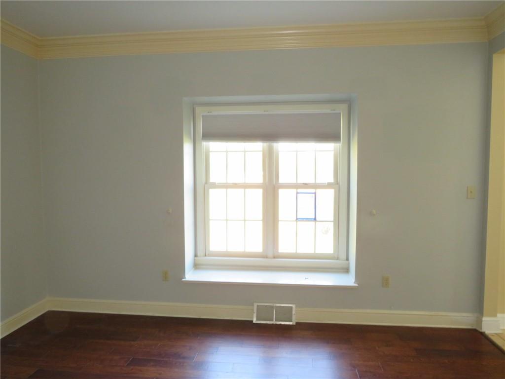 304 Scenic Ridge Court Mars, PA 16046 - Photo 12 of 49 an empty room with wooden floor and windows