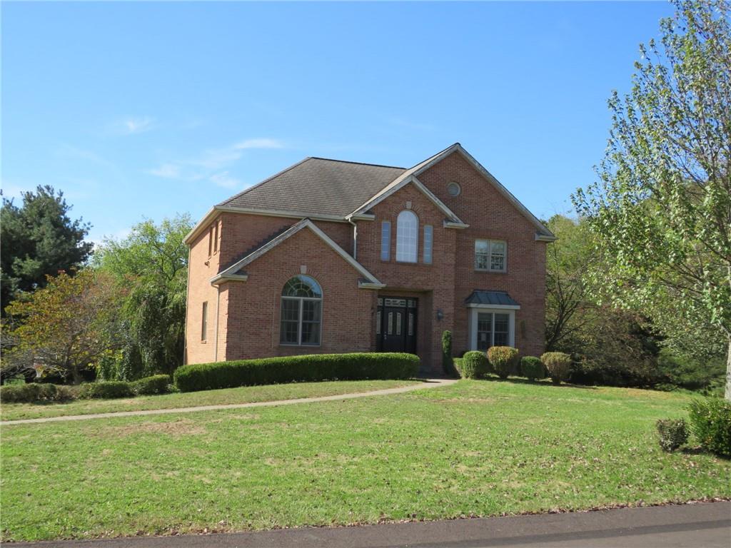 304 Scenic Ridge Court Mars, PA 16046 - Photo 2 of 49 a front view of a house with a yard