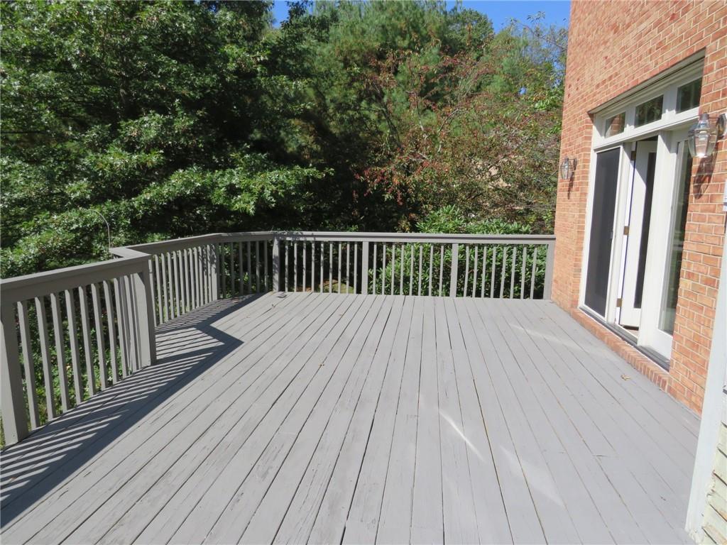 304 Scenic Ridge Court Mars, PA 16046 - Photo 23 of 49 a balcony with wooden floor and fence