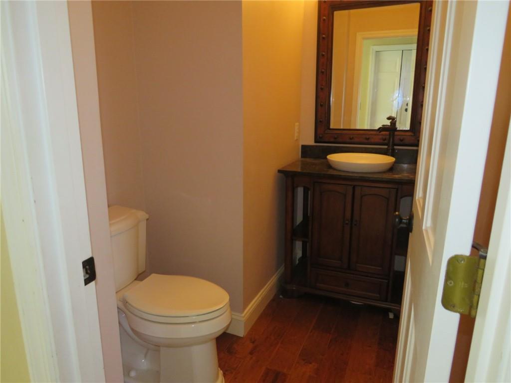 304 Scenic Ridge Court Mars, PA 16046 - Photo 24 of 49 a bathroom with a sink and a toilet