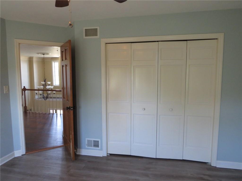 304 Scenic Ridge Court Mars, PA 16046 - Photo 33 of 49 a view of empty room with wooden floor