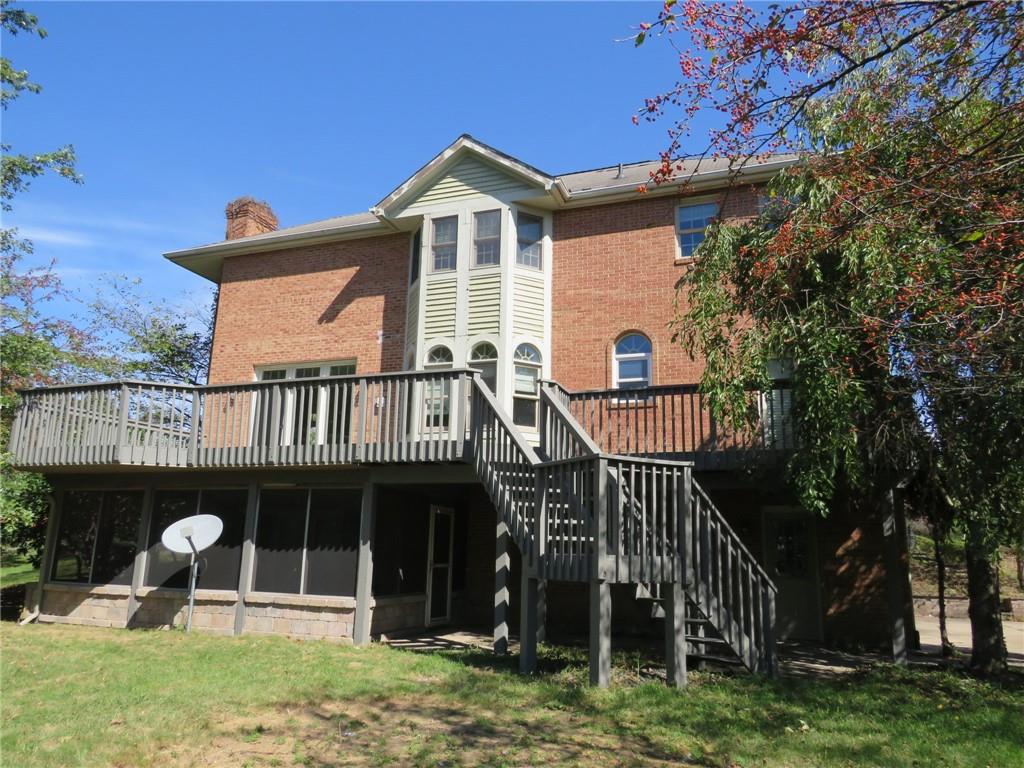 304 Scenic Ridge Court Mars, PA 16046 - Photo 48 of 49 a front view of a house with a garden