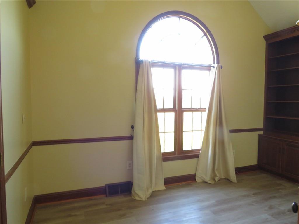 304 Scenic Ridge Court Mars, PA 16046 - Photo 7 of 49 an empty room with wooden floor and windows