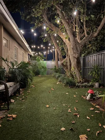 a backyard of a house with lots of green space