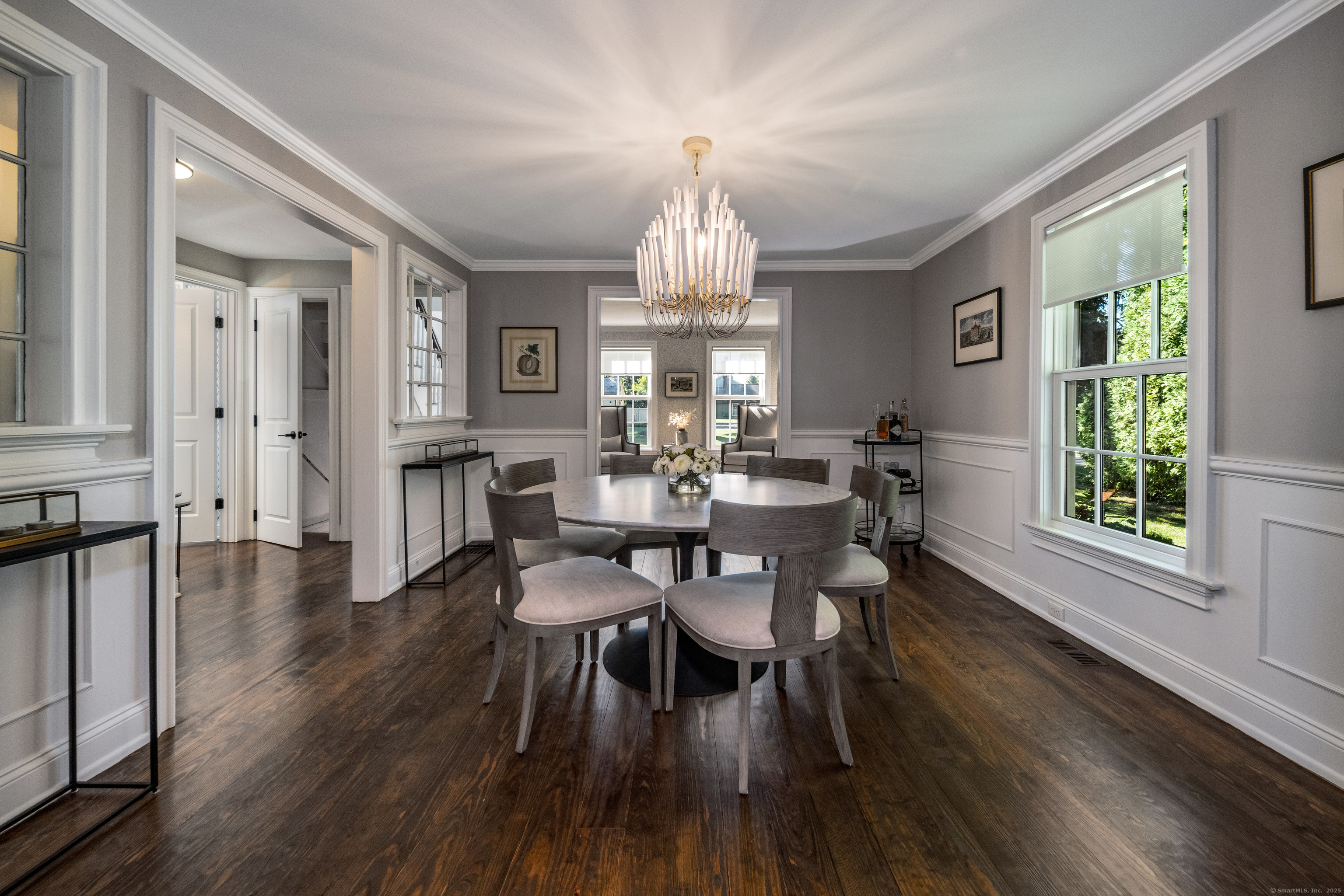 137 Liberty Street Madison, CT 06443 - Photo 3 of 40 a view of a dining room with furniture window and wooden floor