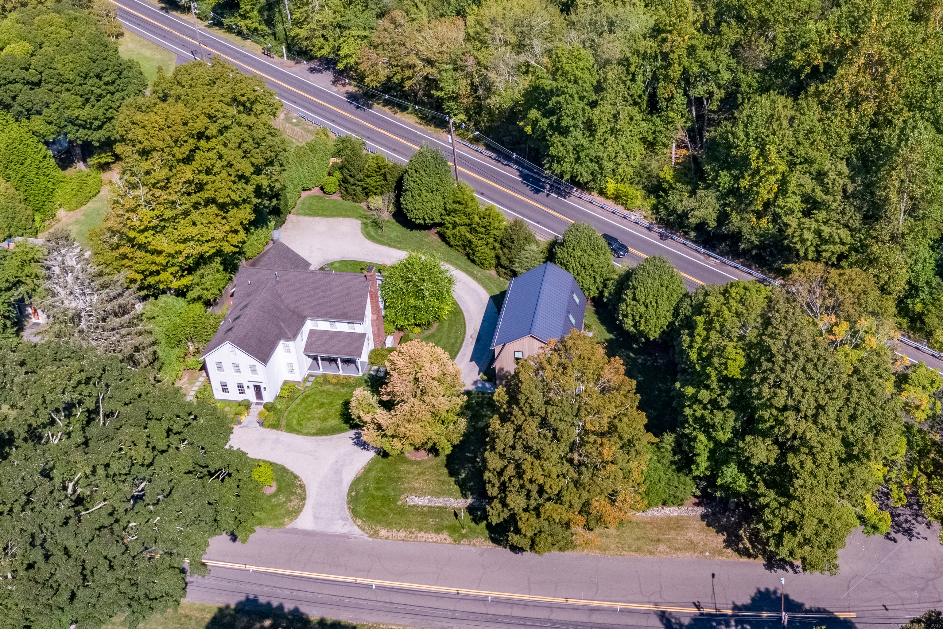 137 Liberty Street Madison, CT 06443 - Photo 31 of 40 a view of a garden with plants