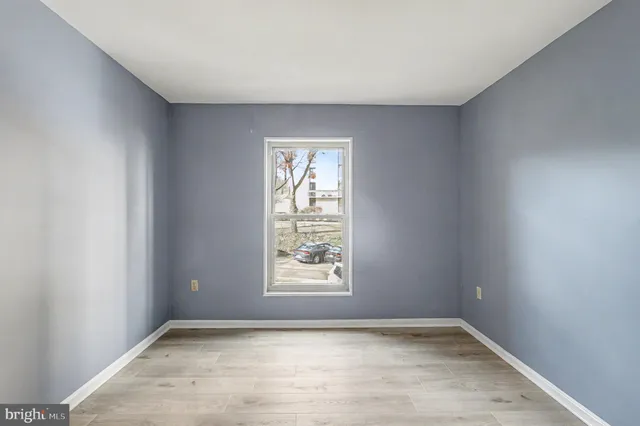 an empty room with windows