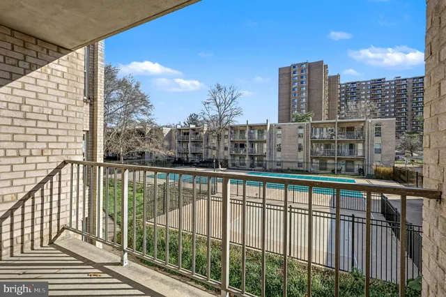a view of a balcony with city view