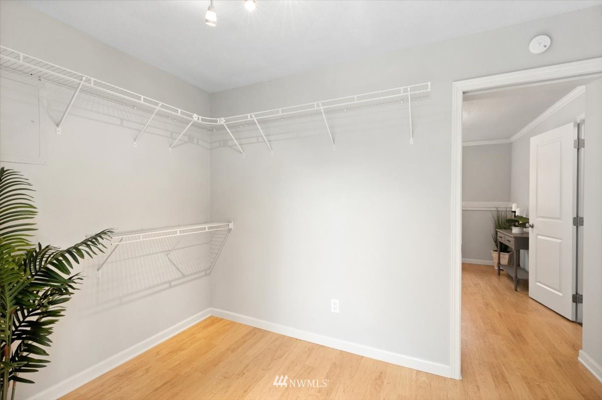 1723 225th Street Southeast Bothell, WA 98021 - Photo 19 of 40 a view of a room with wooden floor