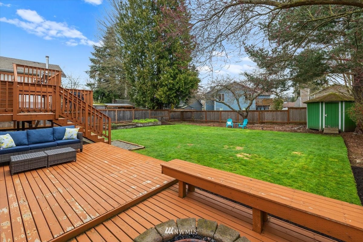 1723 225th Street Southeast Bothell, WA 98021 - Photo 30 of 40 a view of a backyard with sitting area