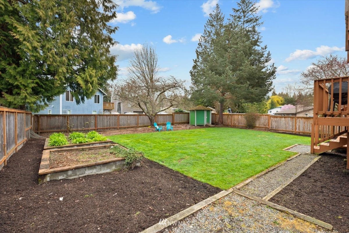 1723 225th Street Southeast Bothell, WA 98021 - Photo 31 of 40 a view of backyard with green space