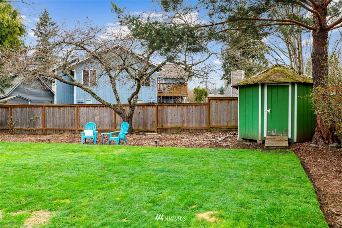 1723 225th Street Southeast Bothell, WA 98021 - Photo 34 of 40 a view of a house with a yard and sitting area