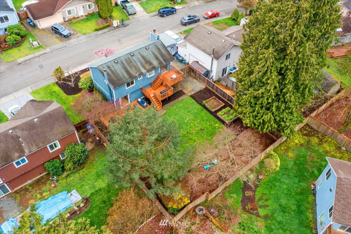 1723 225th Street Southeast Bothell, WA 98021 - Photo 35 of 40 an aerial view of a house with a yard and outdoor seating