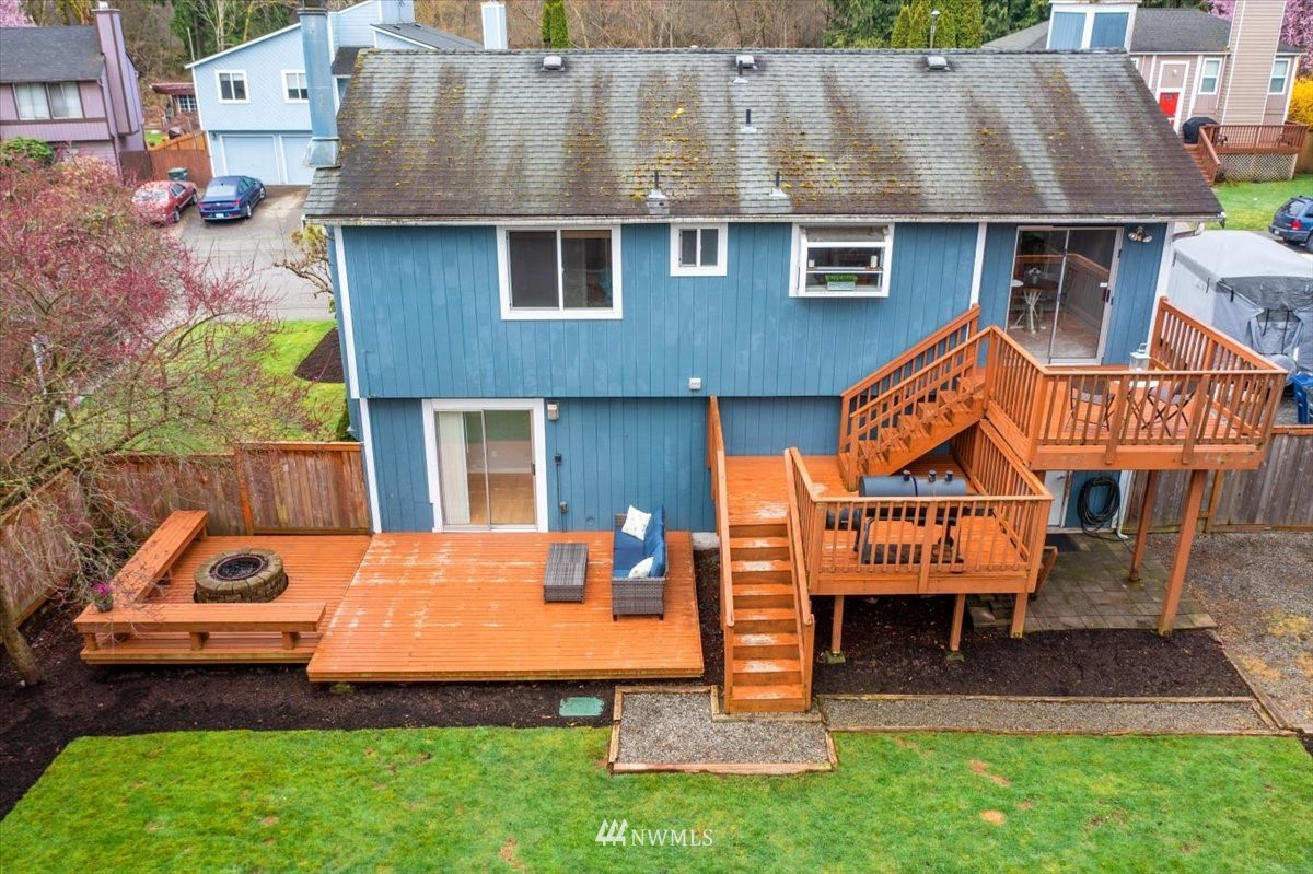 1723 225th Street Southeast Bothell, WA 98021 - Photo 36 of 40 an aerial view of a house with swimming pool and a yard