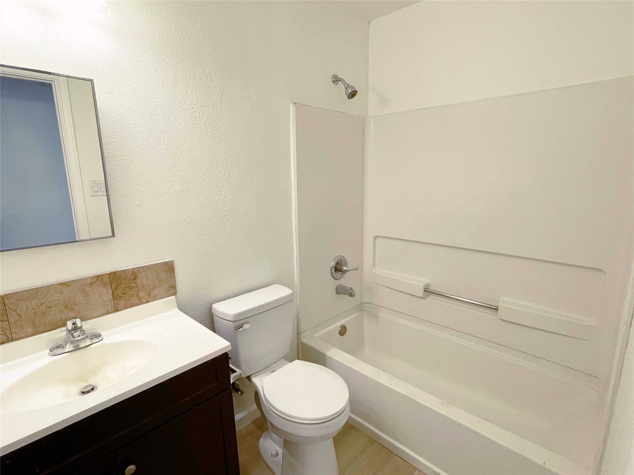 1103 Pike Path Round Rock, TX 78665 - Photo 26 of 36 Step into the inviting comfort of the second bathroom. This bathroom creates a welcoming atmosphere, perfect for both guests and daily use.