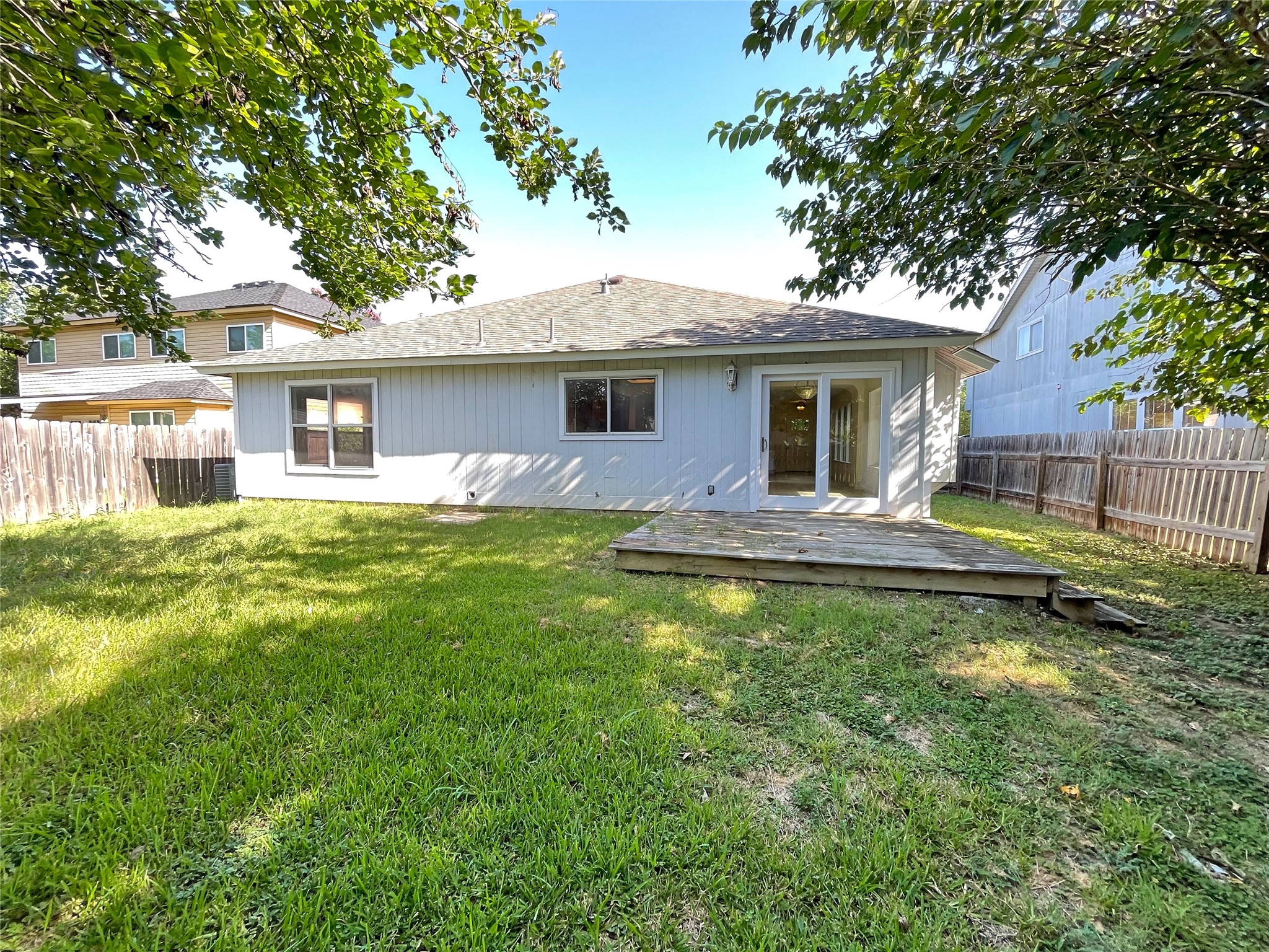 1103 Pike Path Round Rock, TX 78665 - Photo 32 of 36 This spacious outdoor area offers a perfect blend of comfort and versatility, ideal for hosting gatherings or simply unwinding in peace.
