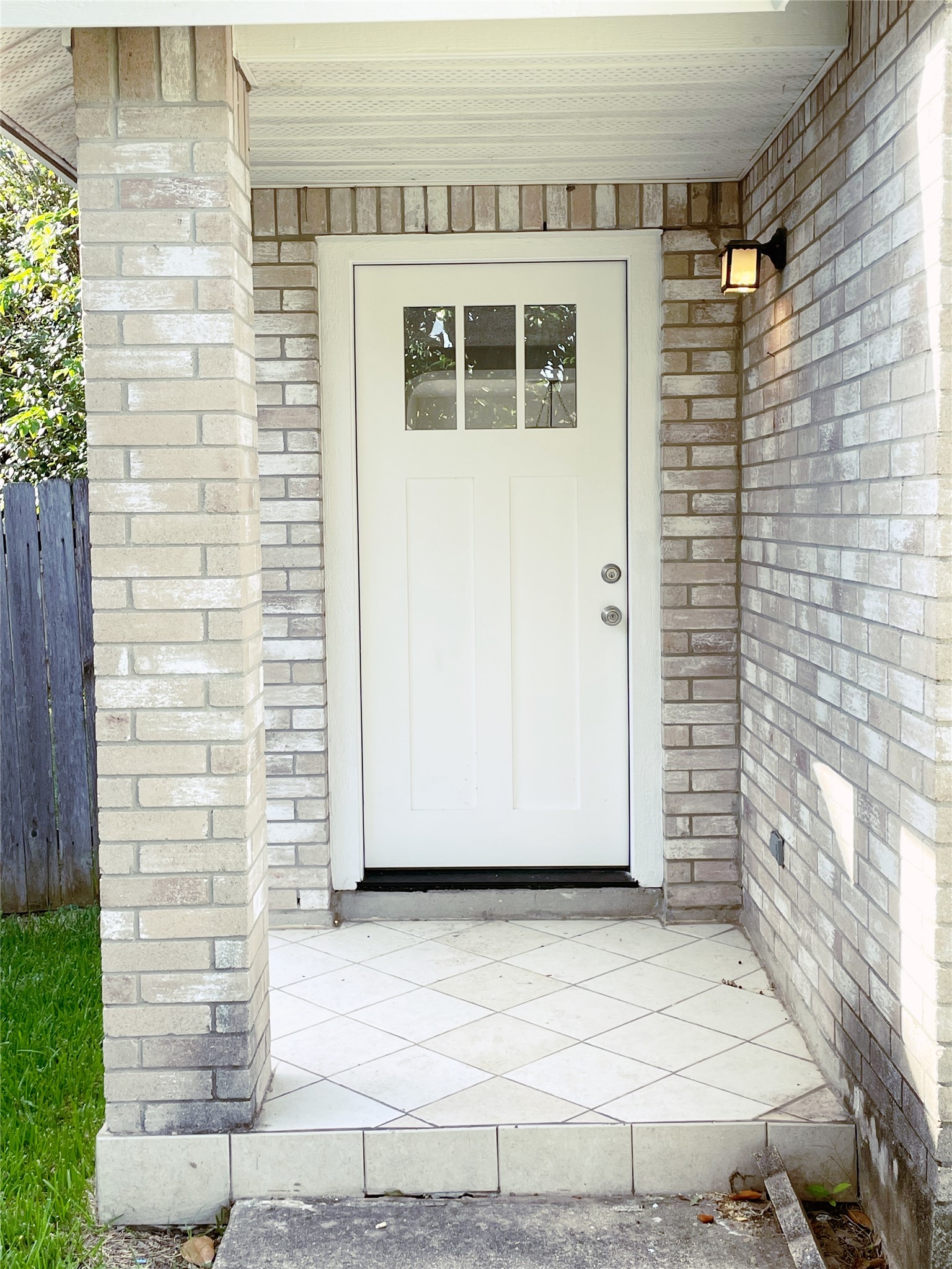 1103 Pike Path Round Rock, TX 78665 - Photo 5 of 36 The inviting entrance of the home, where the front door stands as a symbol of welcome and warmth. Its elegant design and sturdy construction complement the overall architecture, inviting guests into a space that balances style and functionality.