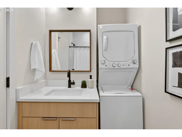 a bathroom with a sink vanity and a mirror