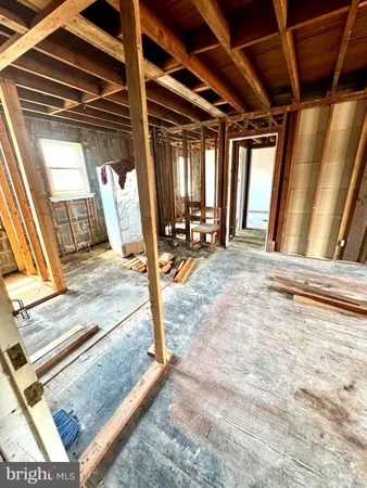 a view of a hall with wooden floor