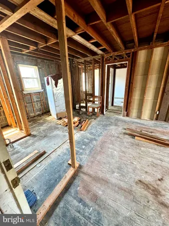 a view of a hall with wooden floor
