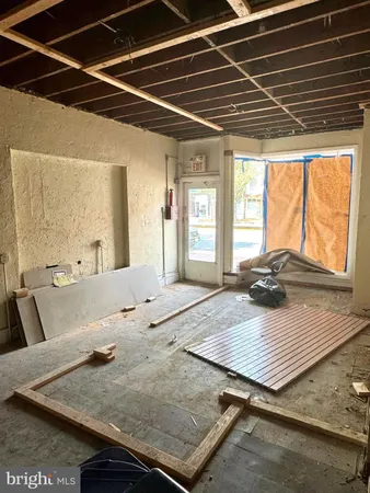 a view of a kitchen with a sink and a dishwasher