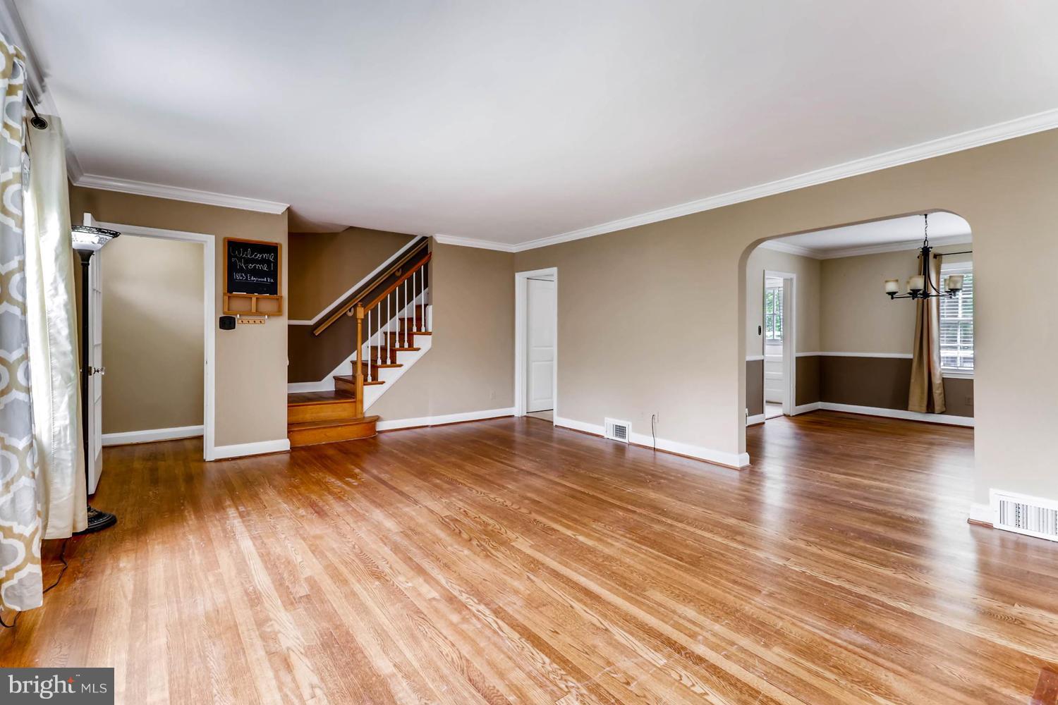 1863 Edgewood Road Towson, MD 21286 - Photo 8 of 30 an empty room with wooden floor and windows