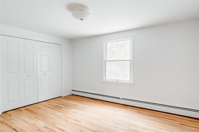 an empty room with a empty space and window