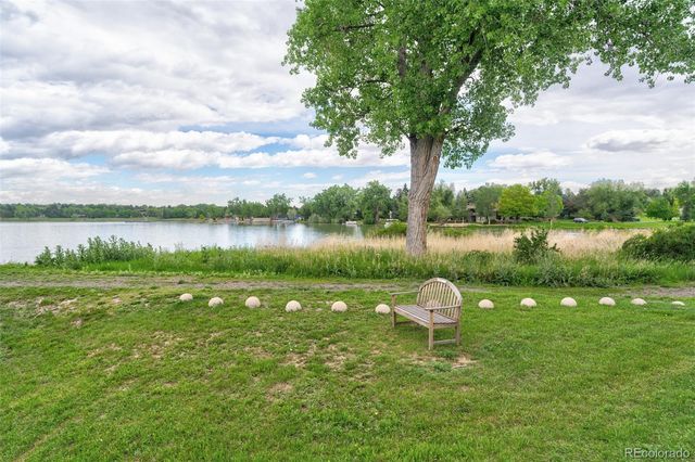 a lake view with a garden